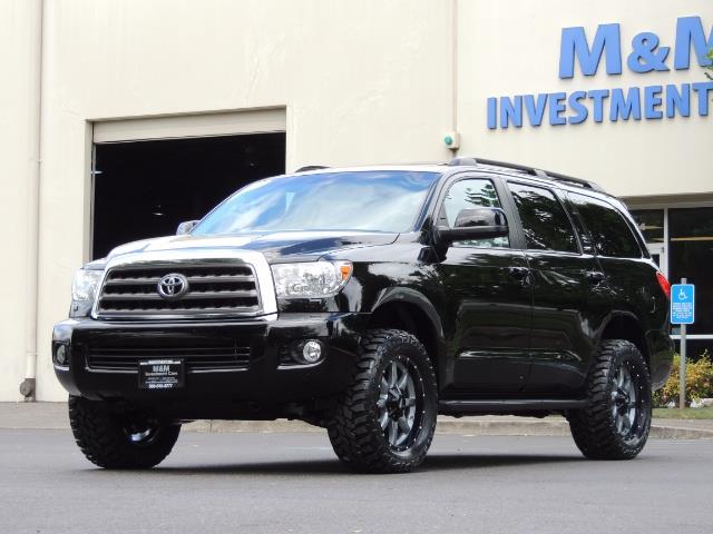 2016 Toyota Sequoia SR5 / 4WD / Third Seat / Sunroof / Backup / LIFTED - Photo 1 - Portland, OR 97217