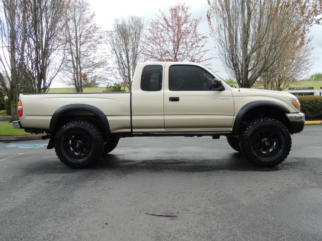 2003 Toyota Tacoma 2dr Xtracab V6 / SR5 / 4X4 / 5-SPEED MANUAL/LIFTED - Photo 4 - Portland, OR 97217