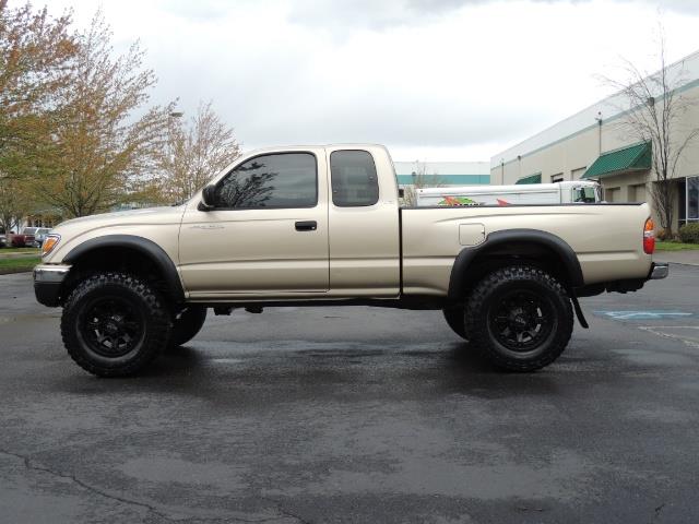 2003 Toyota Tacoma 2dr Xtracab V6 / SR5 / 4X4 / 5-SPEED MANUAL/LIFTED - Photo 3 - Portland, OR 97217