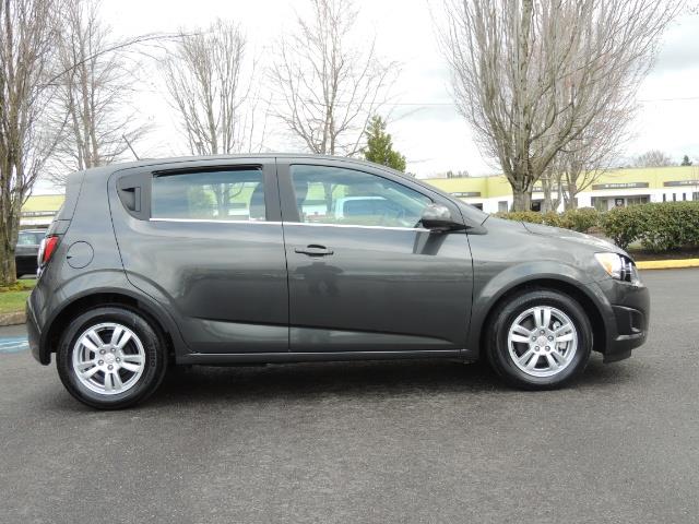 2016 Chevrolet Sonic LT Auto / 4-Door Hatch Back / 1-OWNER / 5000 MILES - Photo 4 - Portland, OR 97217