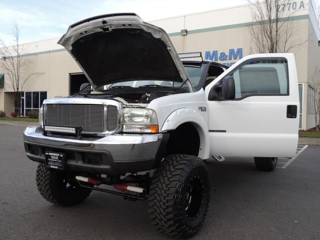 2000 Ford F-350 LARIAT 4X4 LONG BED / 7.3 DIESEL / MONSTER LIFTED - Photo 25 - Portland, OR 97217