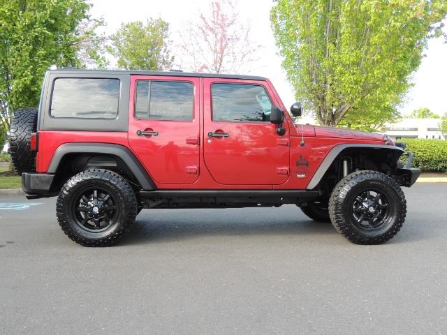 2011 Jeep Wrangler Unlimited Sport / 4X4 / 6-SPEED / LIFTED - Photo 4 - Portland, OR 97217