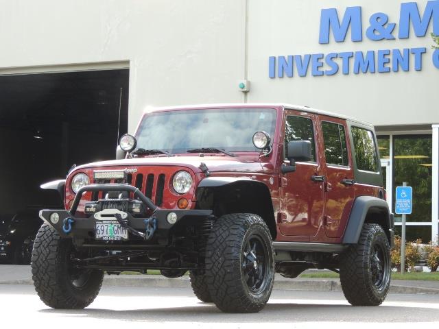 2011 Jeep Wrangler Unlimited Sport / 4X4 / 6-SPEED / LIFTED - Photo 46 - Portland, OR 97217