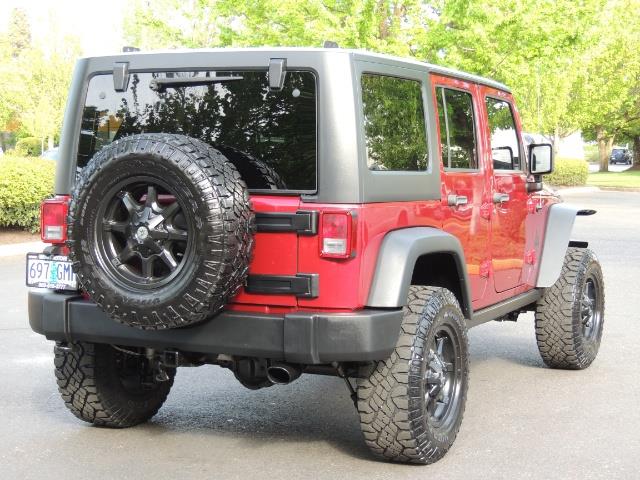 2011 Jeep Wrangler Unlimited Sport / 4X4 / 6-SPEED / LIFTED - Photo 9 - Portland, OR 97217