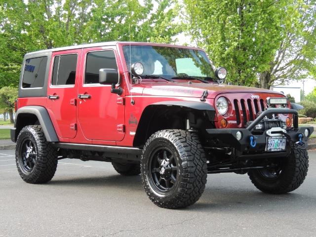2011 Jeep Wrangler Unlimited Sport / 4X4 / 6-SPEED / LIFTED - Photo 2 - Portland, OR 97217