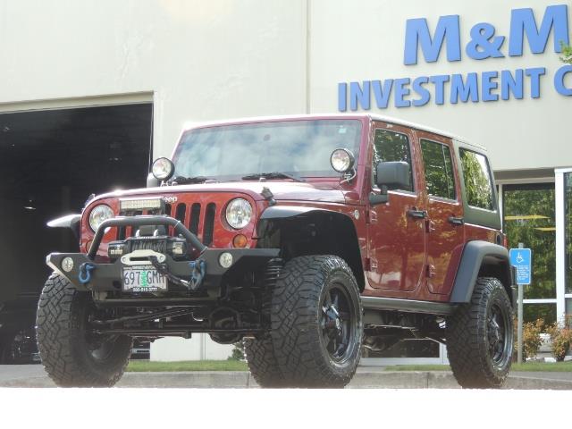 2011 Jeep Wrangler Unlimited Sport / 4X4 / 6-SPEED / LIFTED - Photo 47 - Portland, OR 97217