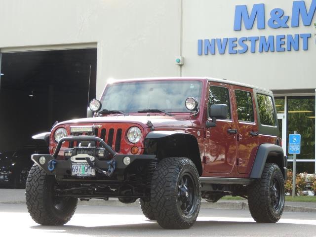 2011 Jeep Wrangler Unlimited Sport / 4X4 / 6-SPEED / LIFTED - Photo 45 - Portland, OR 97217