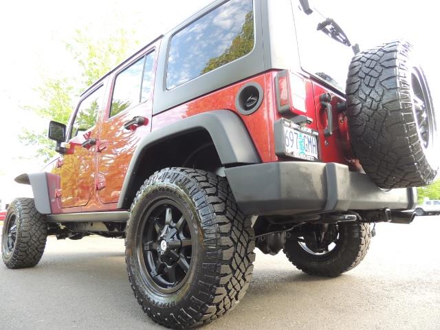 2011 Jeep Wrangler Unlimited Sport / 4X4 / 6-SPEED / LIFTED - Photo 42 - Portland, OR 97217