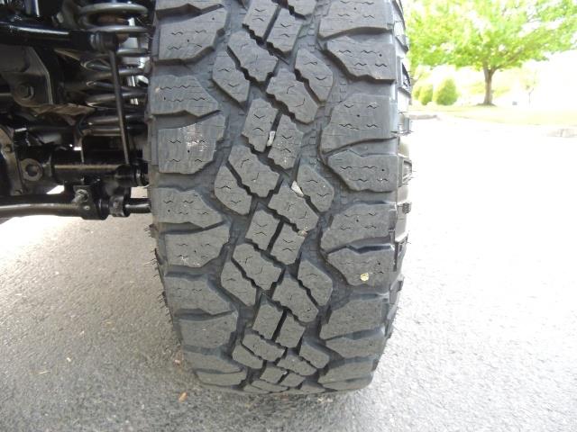 2011 Jeep Wrangler Unlimited Sport / 4X4 / 6-SPEED / LIFTED - Photo 24 - Portland, OR 97217