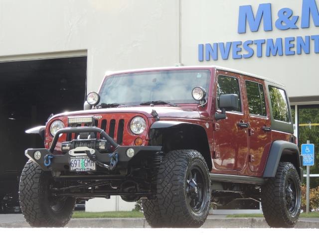 2011 Jeep Wrangler Unlimited Sport / 4X4 / 6-SPEED / LIFTED - Photo 44 - Portland, OR 97217