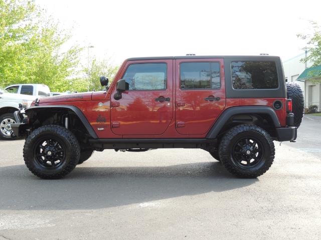 2011 Jeep Wrangler Unlimited Sport / 4X4 / 6-SPEED / LIFTED - Photo 3 - Portland, OR 97217
