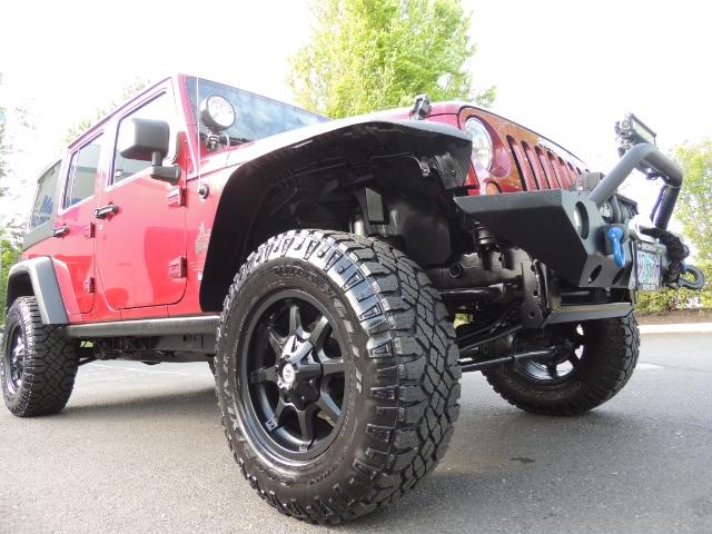 2011 Jeep Wrangler Unlimited Sport / 4X4 / 6-SPEED / LIFTED - Photo 10 - Portland, OR 97217