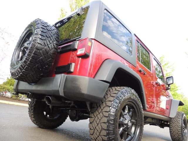 2011 Jeep Wrangler Unlimited Sport / 4X4 / 6-SPEED / LIFTED - Photo 11 - Portland, OR 97217