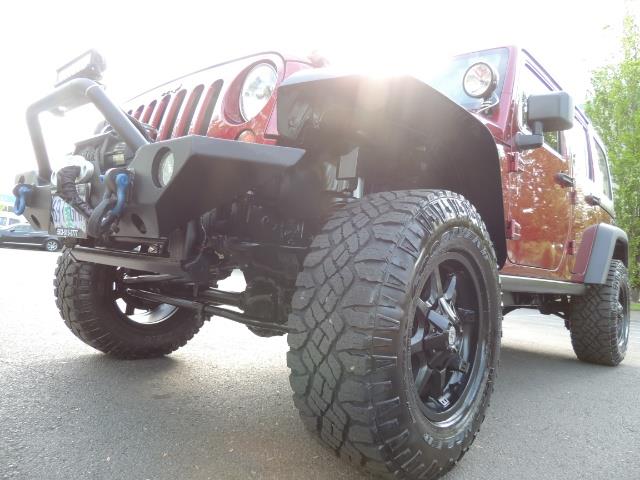 2011 Jeep Wrangler Unlimited Sport / 4X4 / 6-SPEED / LIFTED - Photo 41 - Portland, OR 97217