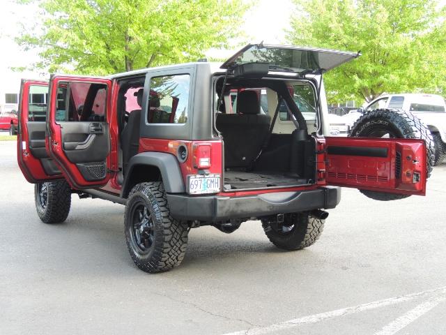 2011 Jeep Wrangler Unlimited Sport / 4X4 / 6-SPEED / LIFTED - Photo 27 - Portland, OR 97217