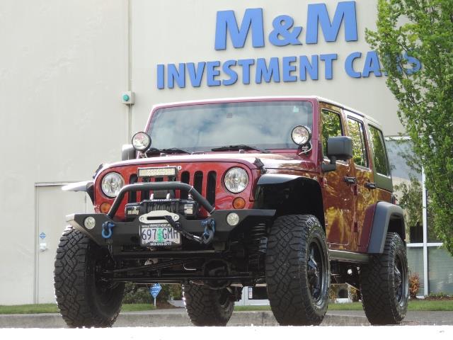 2011 Jeep Wrangler Unlimited Sport / 4X4 / 6-SPEED / LIFTED - Photo 48 - Portland, OR 97217