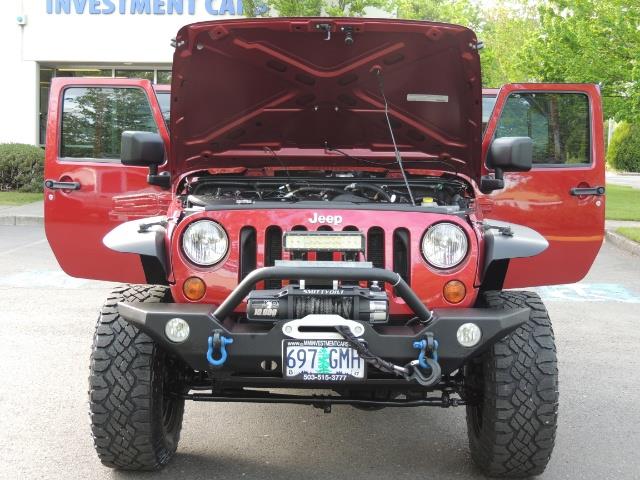 2011 Jeep Wrangler Unlimited Sport / 4X4 / 6-SPEED / LIFTED - Photo 32 - Portland, OR 97217