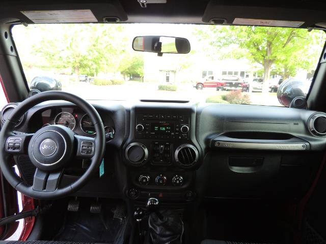 2011 Jeep Wrangler Unlimited Sport / 4X4 / 6-SPEED / LIFTED - Photo 35 - Portland, OR 97217