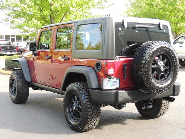 2011 Jeep Wrangler Unlimited Sport / 4X4 / 6-SPEED / LIFTED - Photo 8 - Portland, OR 97217