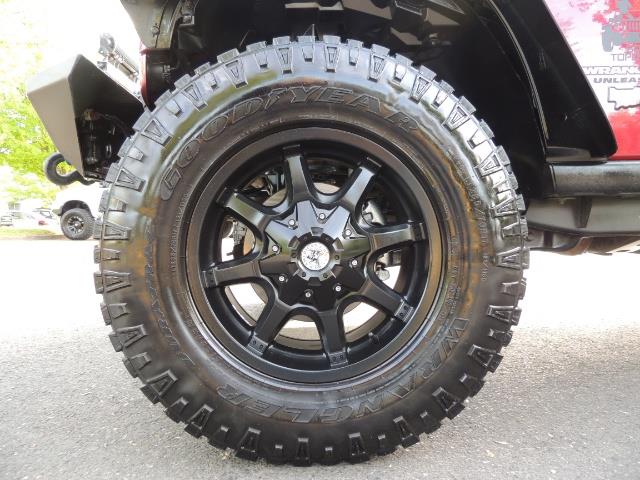 2011 Jeep Wrangler Unlimited Sport / 4X4 / 6-SPEED / LIFTED - Photo 23 - Portland, OR 97217