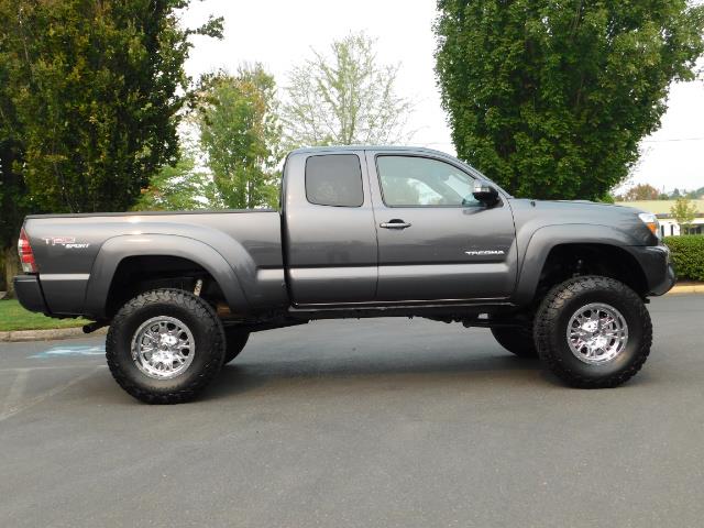 2012 Toyota Tacoma V6 / TRD SPORT / 4X4 / LIFTED LIFTED - Photo 4 - Portland, OR 97217