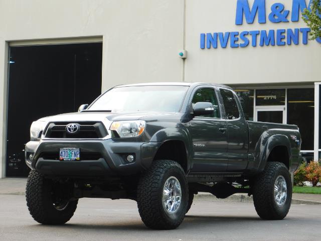 2012 Toyota Tacoma V6 / TRD SPORT / 4X4 / LIFTED LIFTED - Photo 1 - Portland, OR 97217