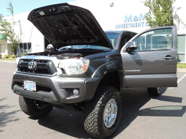 2012 Toyota Tacoma V6 / TRD SPORT / 4X4 / LIFTED LIFTED - Photo 25 - Portland, OR 97217