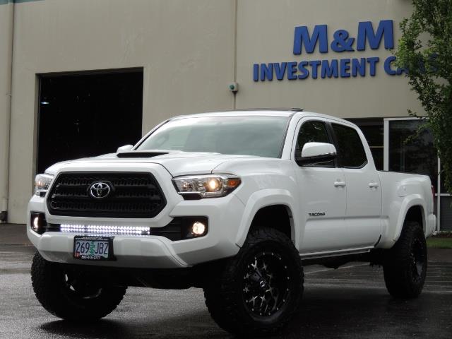 2016 Toyota Tacoma TRD Sport / 4X4 / Navi / Sunroof / LOADED / LIFTED - Photo 55 - Portland, OR 97217