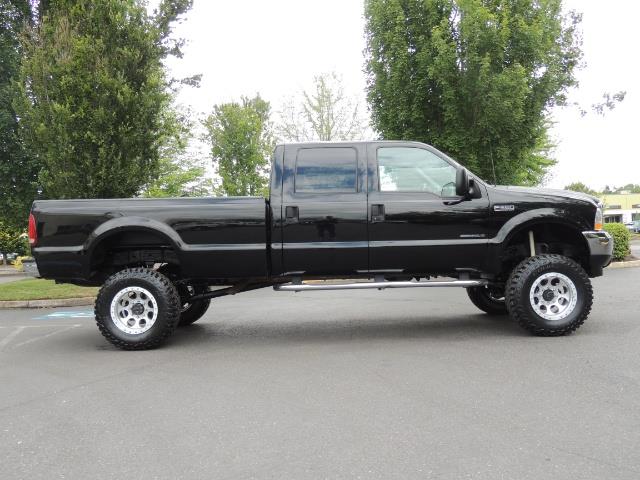 2001 Ford F-350 Super Duty Lariat / 4X4 / 7.3L DIESEL / LIFTED - Photo 4 - Portland, OR 97217