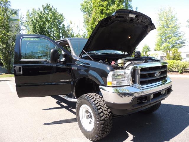 2001 Ford F-350 Super Duty Lariat / 4X4 / 7.3L DIESEL / LIFTED - Photo 31 - Portland, OR 97217