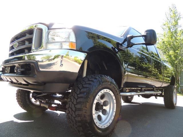2001 Ford F-350 Super Duty Lariat / 4X4 / 7.3L DIESEL / LIFTED - Photo 54 - Portland, OR 97217