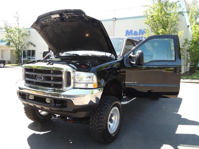 2001 Ford F-350 Super Duty Lariat / 4X4 / 7.3L DIESEL / LIFTED - Photo 25 - Portland, OR 97217