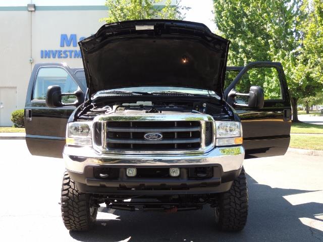 2001 Ford F-350 Super Duty Lariat / 4X4 / 7.3L DIESEL / LIFTED - Photo 32 - Portland, OR 97217