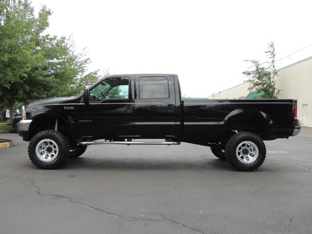 2001 Ford F-350 Super Duty Lariat / 4X4 / 7.3L DIESEL / LIFTED - Photo 3 - Portland, OR 97217