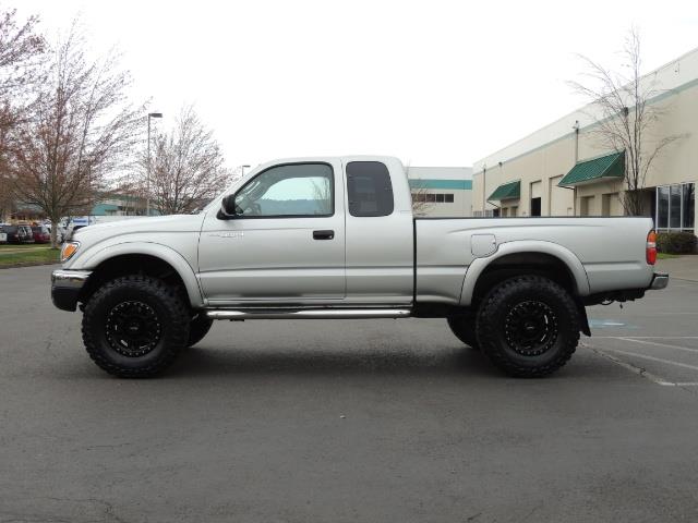 2003 Toyota Tacoma V6 2dr Xtracab / 4X4 / 3.4L / 5-SPEED / LIFTED - Photo 3 - Portland, OR 97217